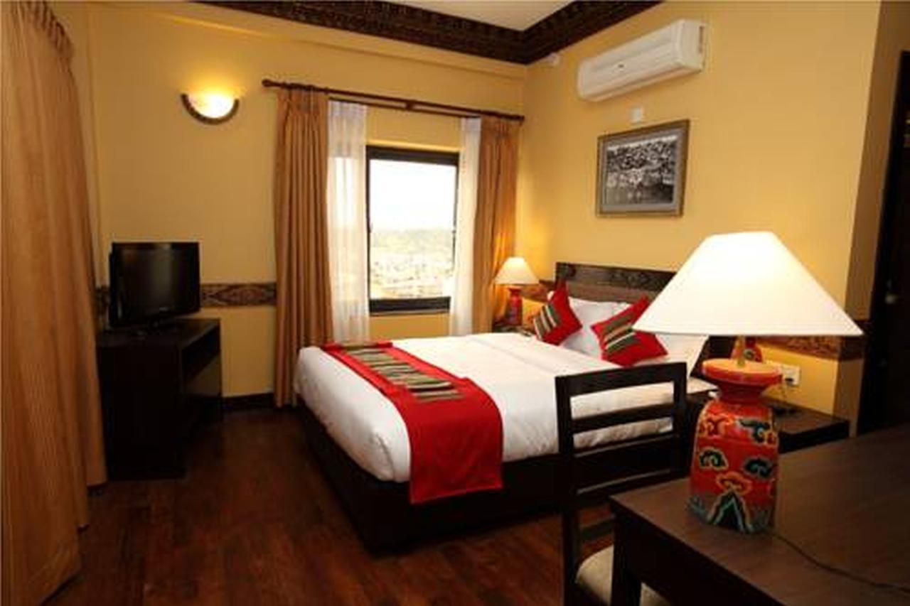 Hotel Tibet International Катманду Стая снимка
